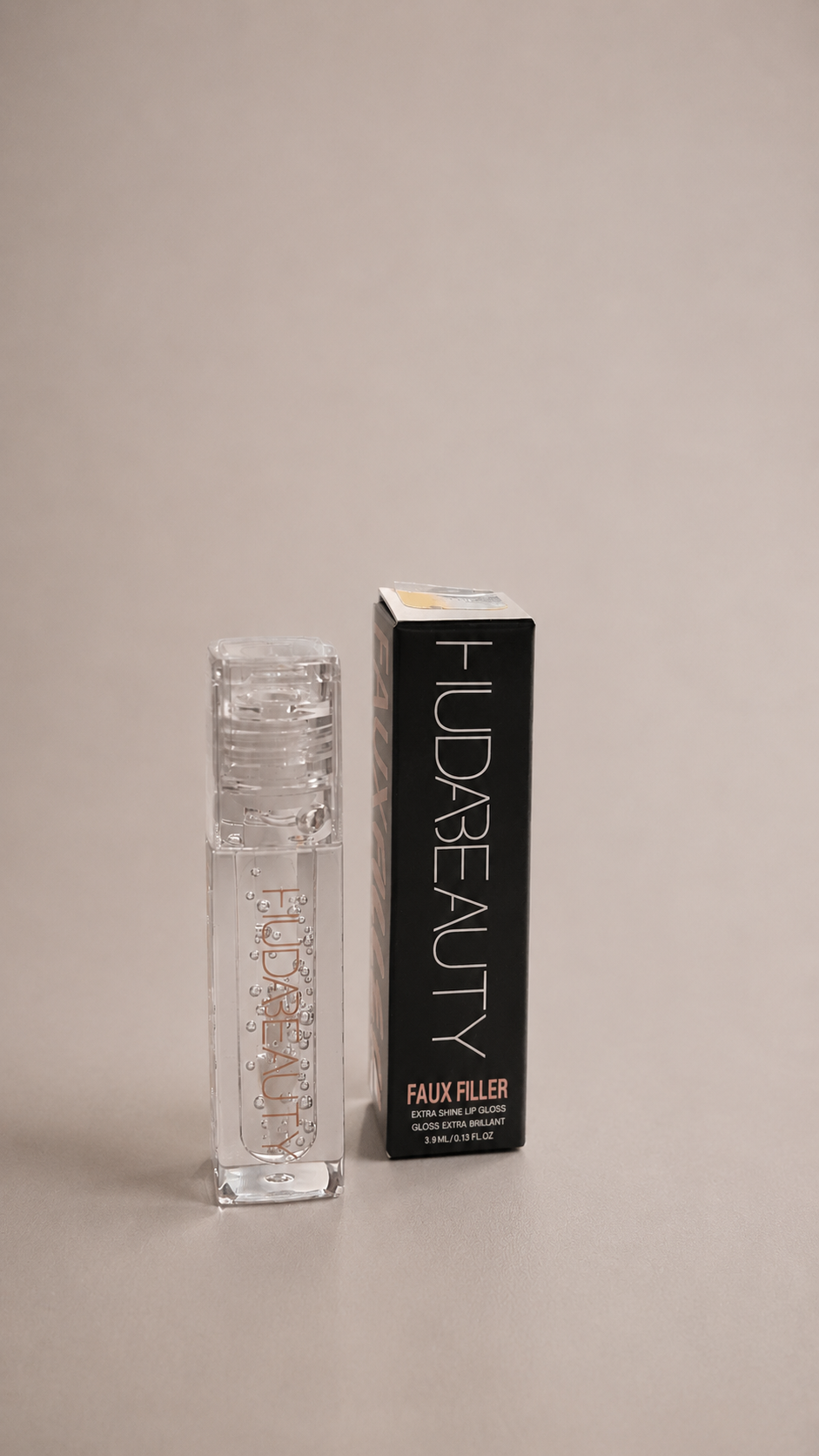 Huda Beauty – Faux Filler Extra Shine Lip Gloss