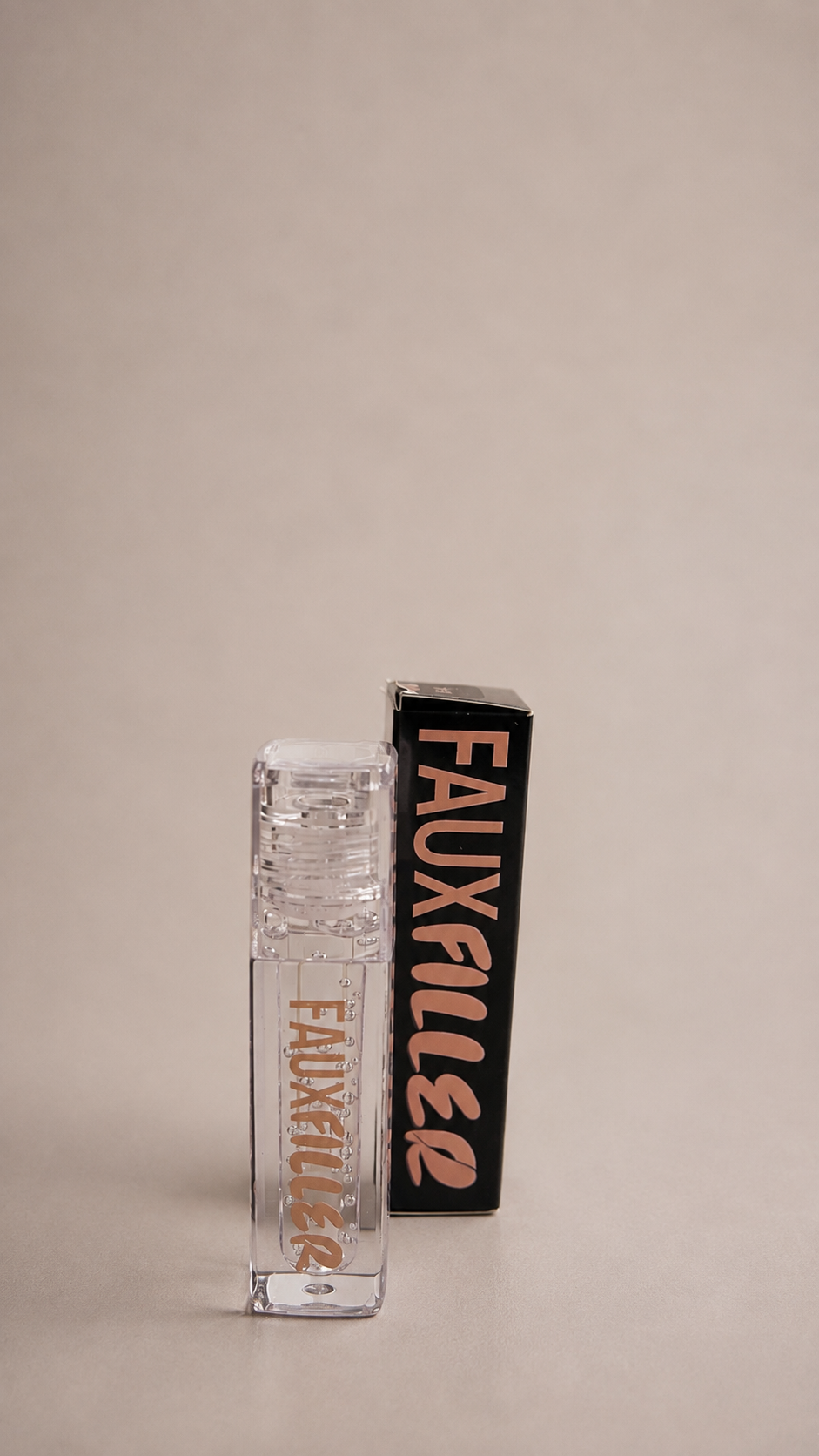 Huda Beauty – Faux Filler Extra Shine Lip Gloss